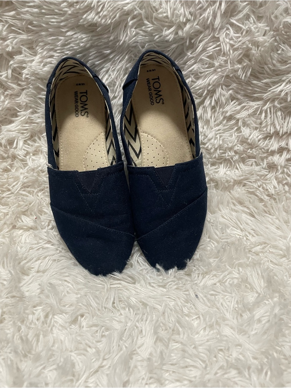 Toms Women's Navy Canvas Slip-On Moccasins, size 9.
